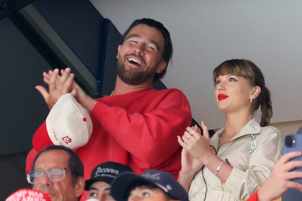Travis Kelce, left, and Taylor Swift react as the Edmonton Oilers and the Florida Panthers play during the first period in Game Four of the 2025 Stanley Cup Final at Amerant Bank Arena on June 12, 2025 in Sunrise, Florida.
