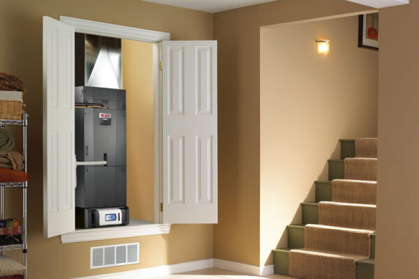 Trane CleanEffects whole-home air filtration system installed alongside a home HVAC unit to reduce allergy symptoms indoors