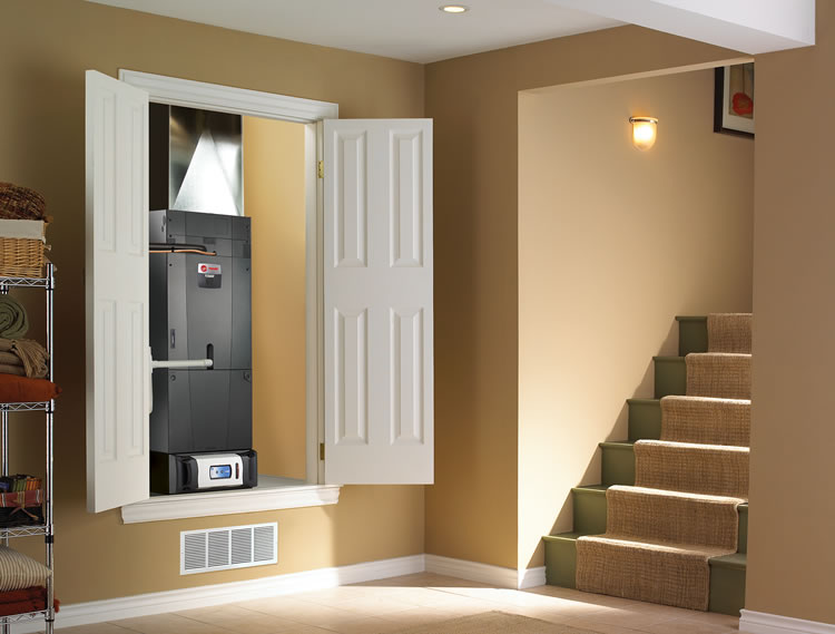 Trane CleanEffects whole-home air filtration system installed alongside a home HVAC unit to reduce allergy symptoms indoors