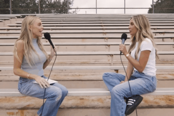 Alex Cooper and Alix Earle on bleachers.