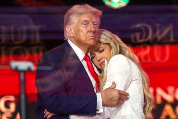 Erika Kirk joins U.S. President Donald Trump onstage during the memorial service for political activist Charlie Kirk at State Farm Stadium on September 21, 2025 in Glendale, Arizona.