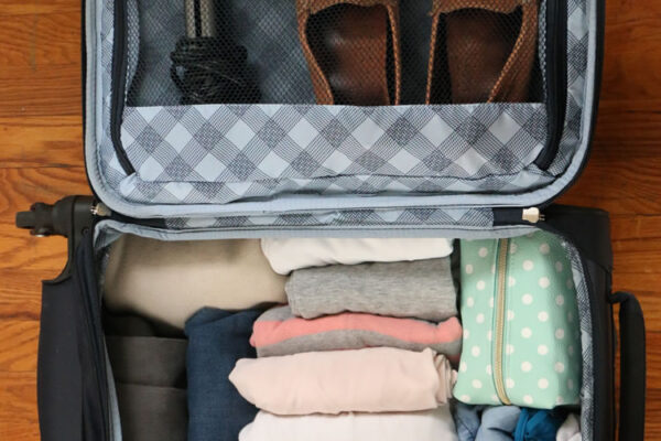 Travelpro Maxlite luggage with rolled clothing packing tips for travel 2026