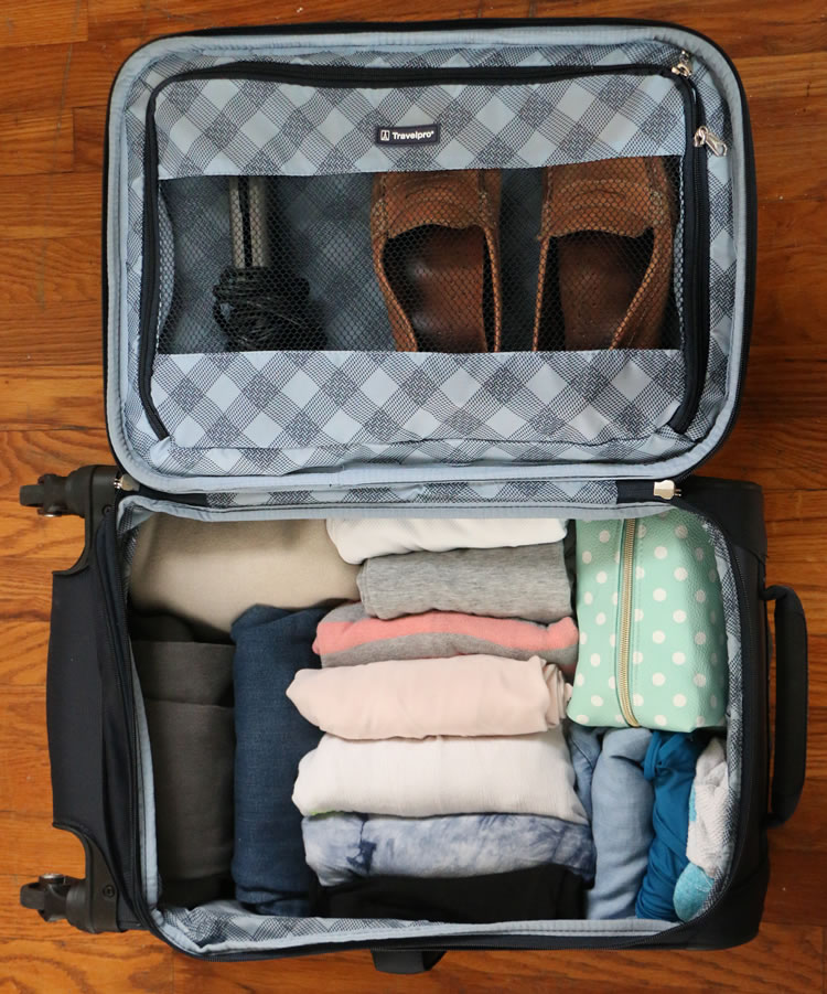 Travelpro Maxlite luggage with rolled clothing packing tips for travel 2026