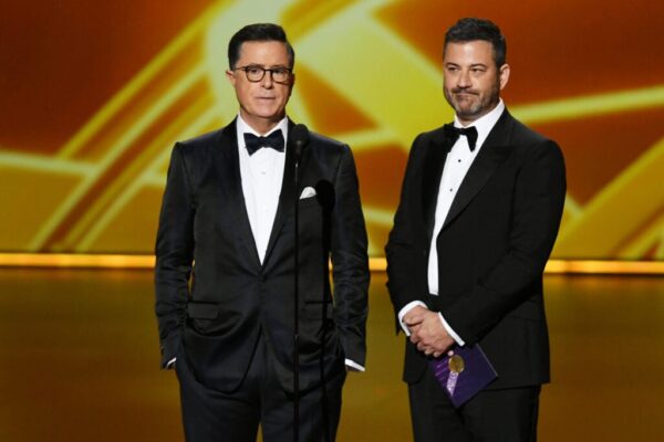 Stephen Colbert and Jimmy Kimmel speak onstage during the 71st Emmy Awards at Microsoft Theater on September 22, 2019 in Los Angeles, California.