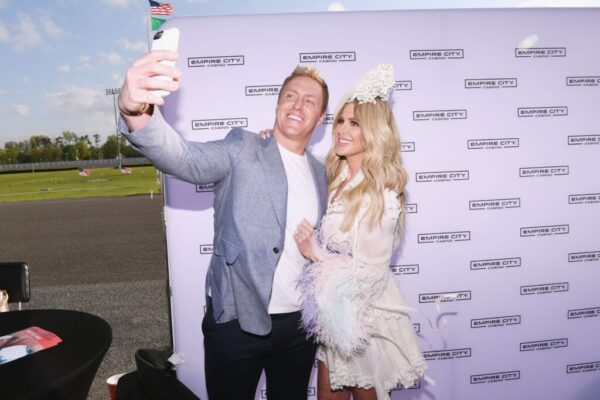 NFL Player Kroy Biermann and TV Personality Kim Zolciak attend as Kim Zolciak hosts the Kentucky Derby hat contest at Empire City Casino at Yonkers Raceway on May 6, 2017 in Yonkers, New York.