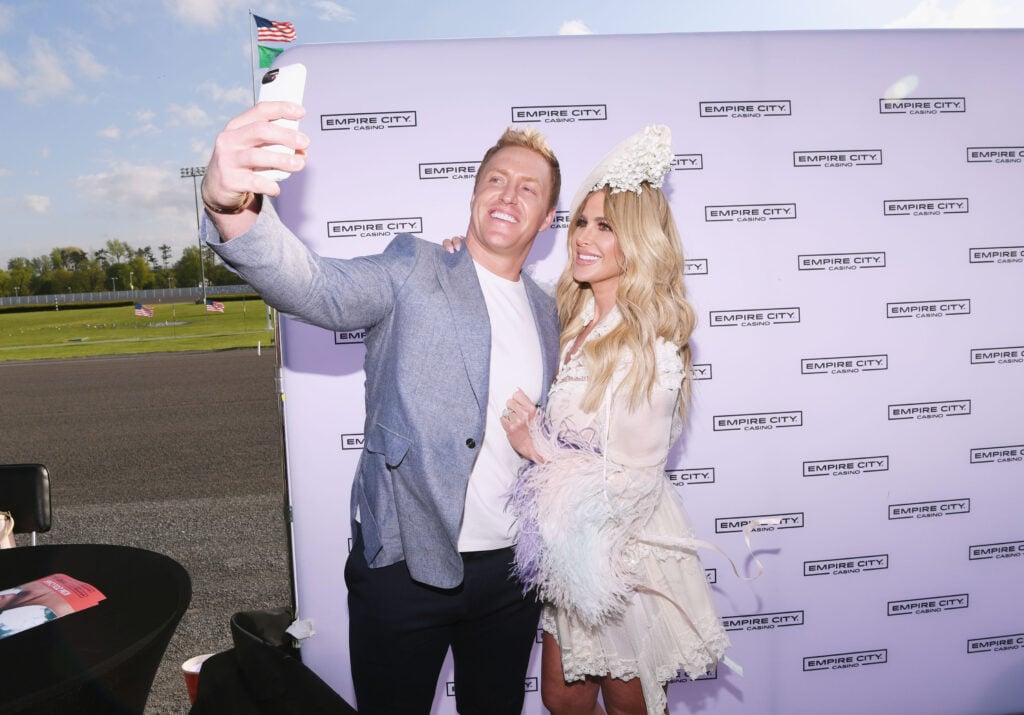 NFL Player Kroy Biermann and TV Personality Kim Zolciak attend as Kim Zolciak hosts the Kentucky Derby hat contest at Empire City Casino at Yonkers Raceway on May 6, 2017 in Yonkers, New York.