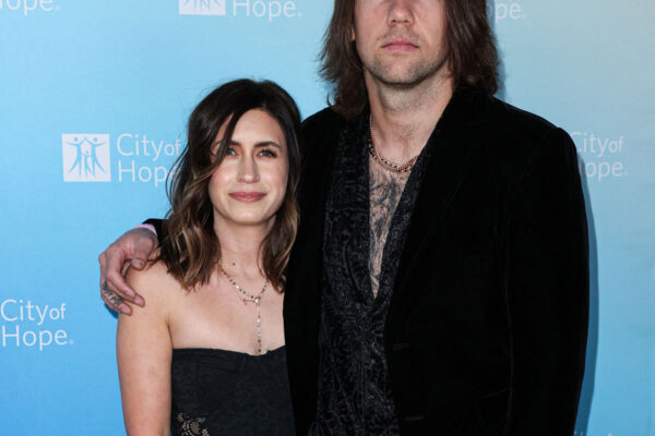 Caleb Shomo & wife Fleur