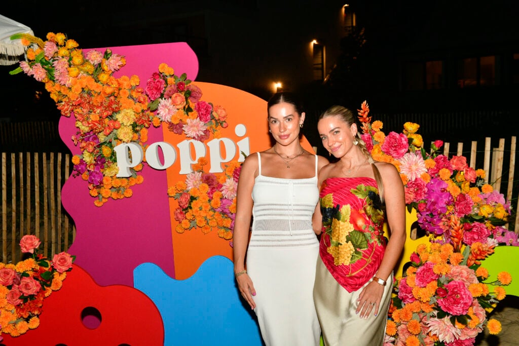 Avery Woods and Emilie Kiser attend the Poppi Soda