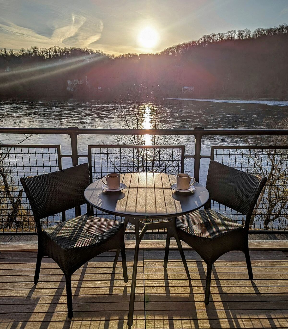 Morning coffee on your private balcony overlooking the Delaware River at River House at Odette