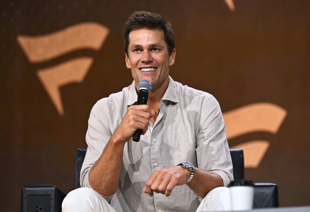 Tom Brady speaks at the Fanatics Fest NYC 2024 at Jacob Javits Center on August 16, 2024 in New York City.